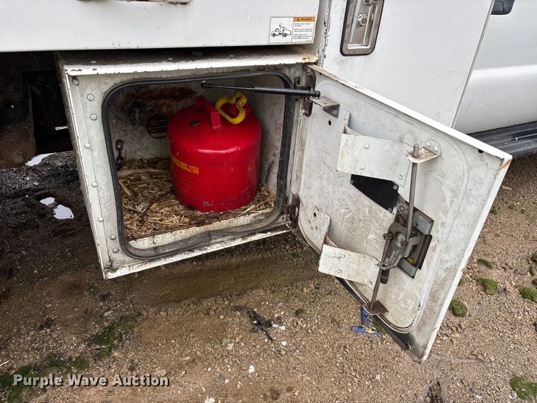 image for item YA2132 2016 Ford F550 Super Duty Crew Cab chipper truck