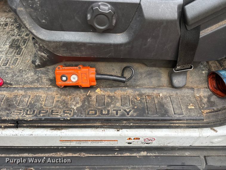 image for item YA2132 2016 Ford F550 Super Duty Crew Cab chipper truck