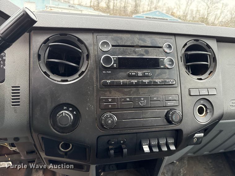 image for item YA2132 2016 Ford F550 Super Duty Crew Cab chipper truck