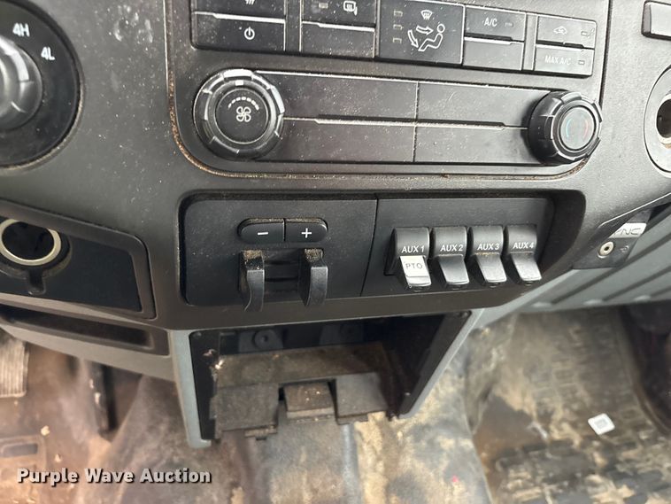 image for item YA2132 2016 Ford F550 Super Duty Crew Cab chipper truck