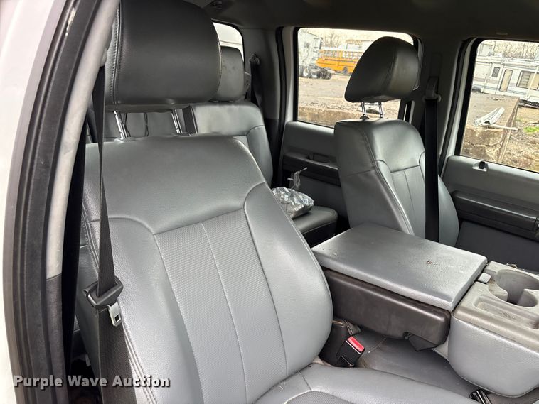 image for item YA2132 2016 Ford F550 Super Duty Crew Cab chipper truck