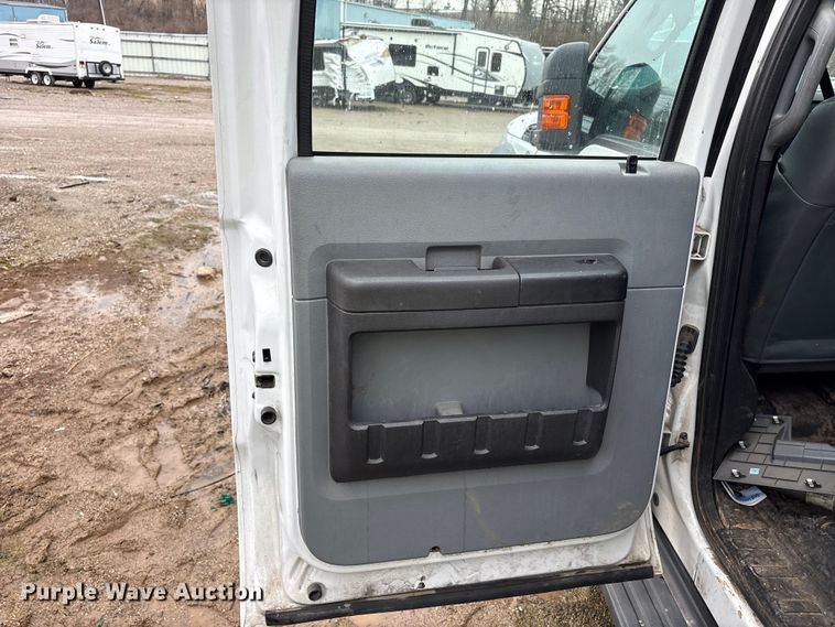 image for item YA2132 2016 Ford F550 Super Duty Crew Cab chipper truck