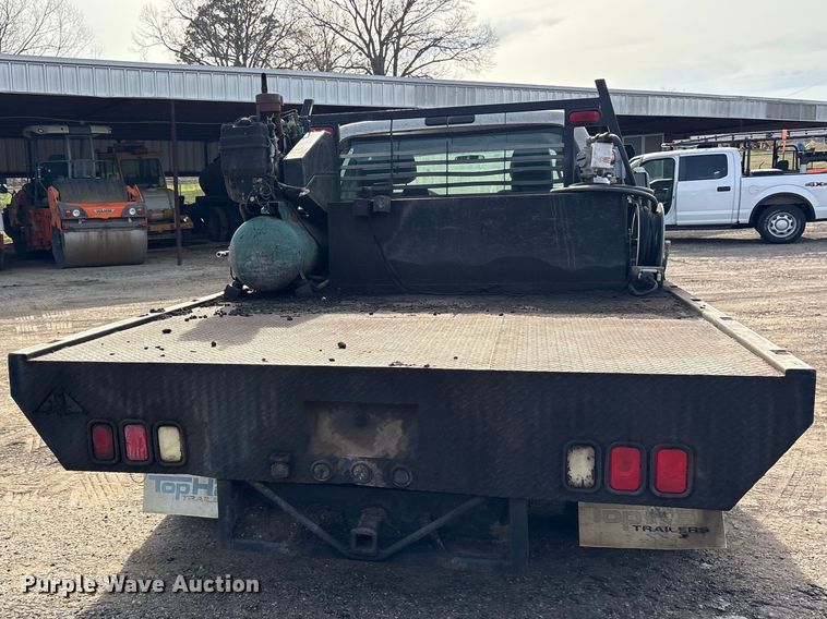 image for item ES8593 2015 Ford F350 Super Duty Crew Cab flatbed pickup truck