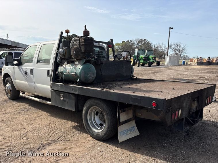 image for item ES8593 2015 Ford F350 Super Duty Crew Cab flatbed pickup truck