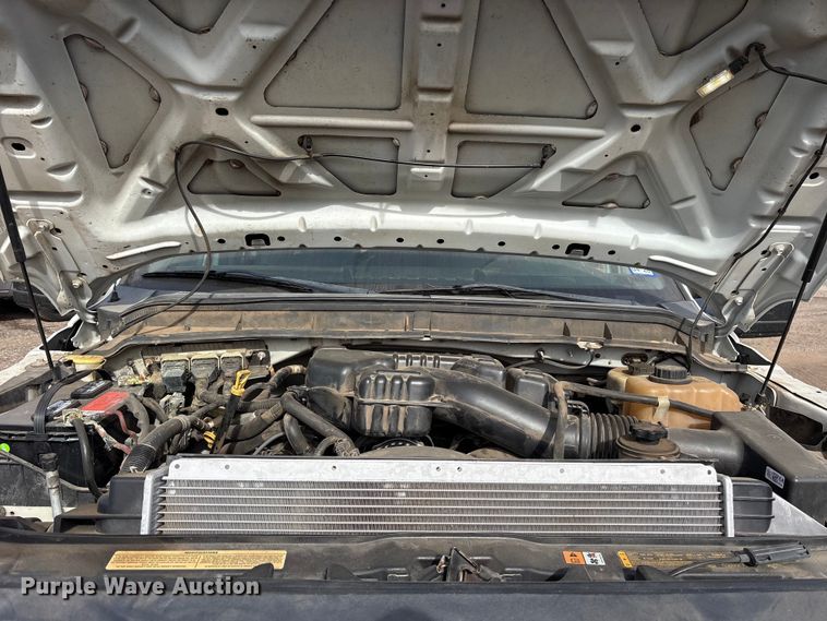 image for item ES8593 2015 Ford F350 Super Duty Crew Cab flatbed pickup truck