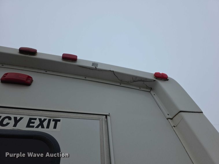 image for item FI0902 2011 Ford E350 Super Duty shuttle bus