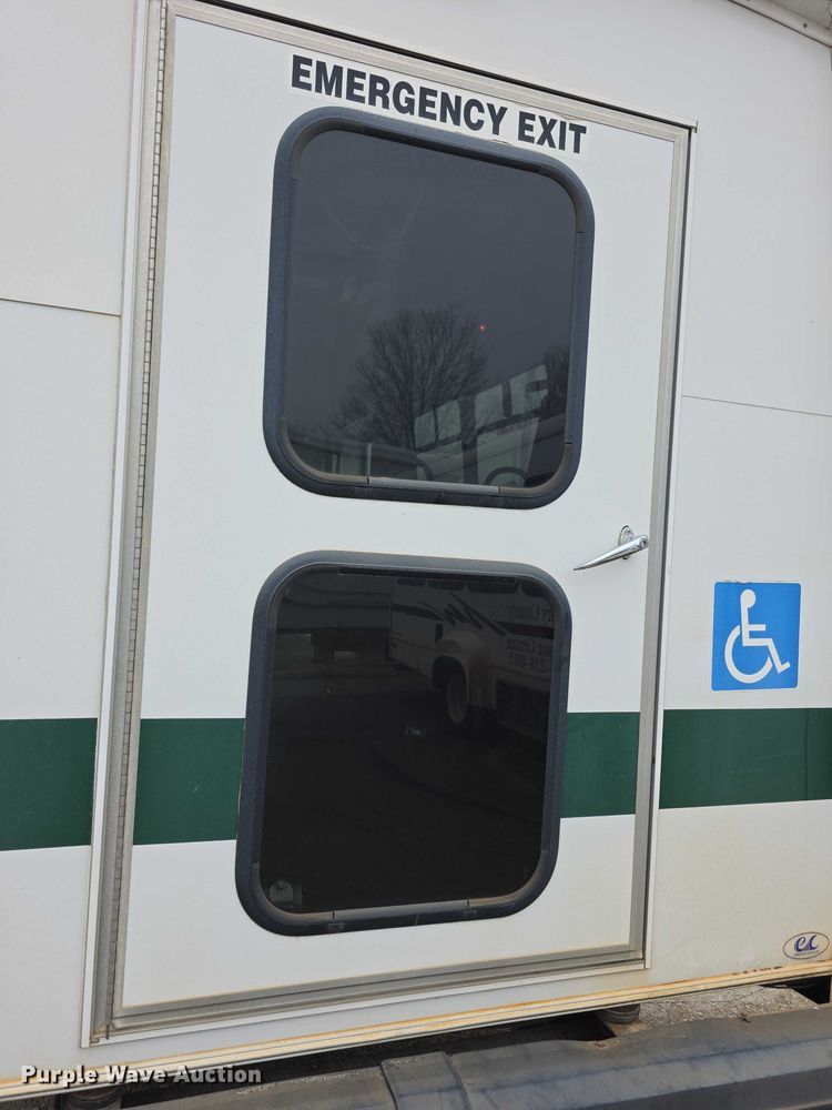 image for item FI0902 2011 Ford E350 Super Duty shuttle bus