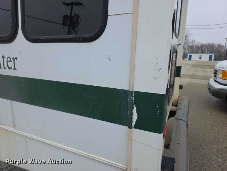 image for item FI0902 2011 Ford E350 Super Duty shuttle bus