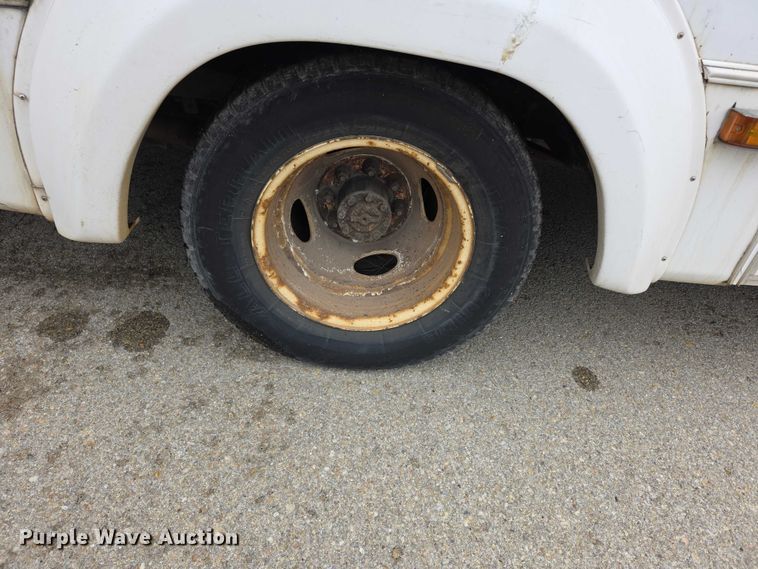 image for item FI0902 2011 Ford E350 Super Duty shuttle bus