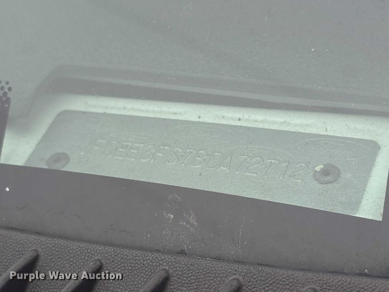 image for item FI0902 2011 Ford E350 Super Duty shuttle bus