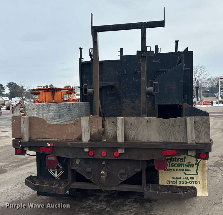 image for item FK1581 2002 International 4700 Low Profile Crew Cab flatbed truck