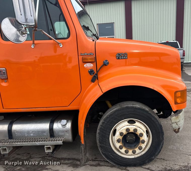 image for item FK1581 2002 International 4700 Low Profile Crew Cab flatbed truck