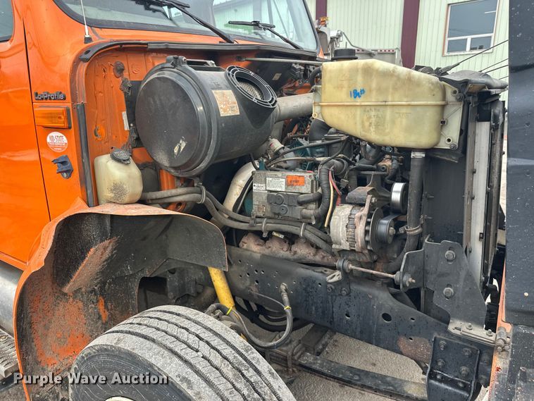 image for item FK1581 2002 International 4700 Low Profile Crew Cab flatbed truck