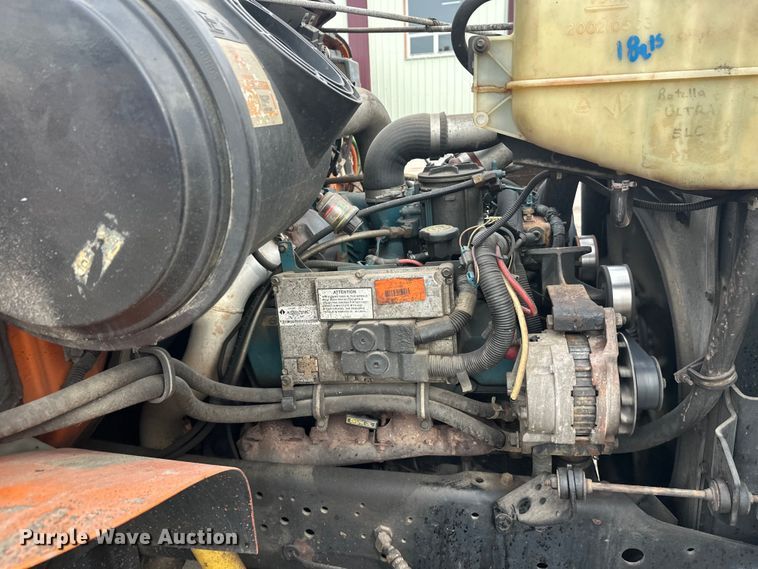 image for item FK1581 2002 International 4700 Low Profile Crew Cab flatbed truck