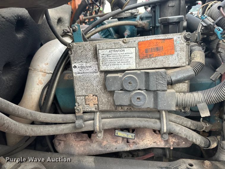 image for item FK1581 2002 International 4700 Low Profile Crew Cab flatbed truck