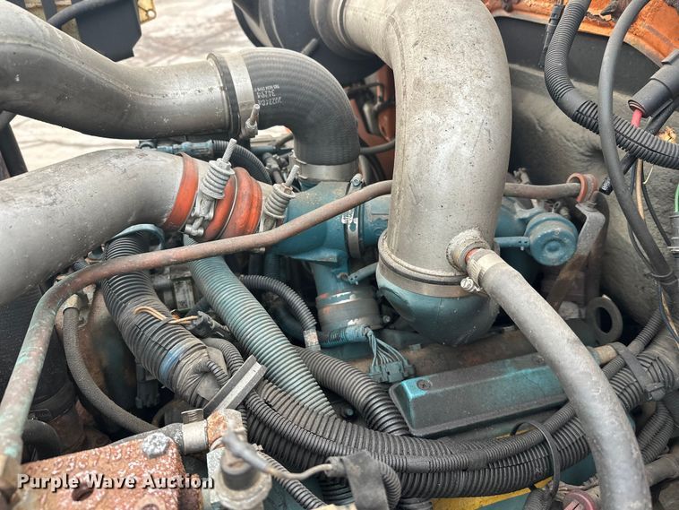 image for item FK1581 2002 International 4700 Low Profile Crew Cab flatbed truck