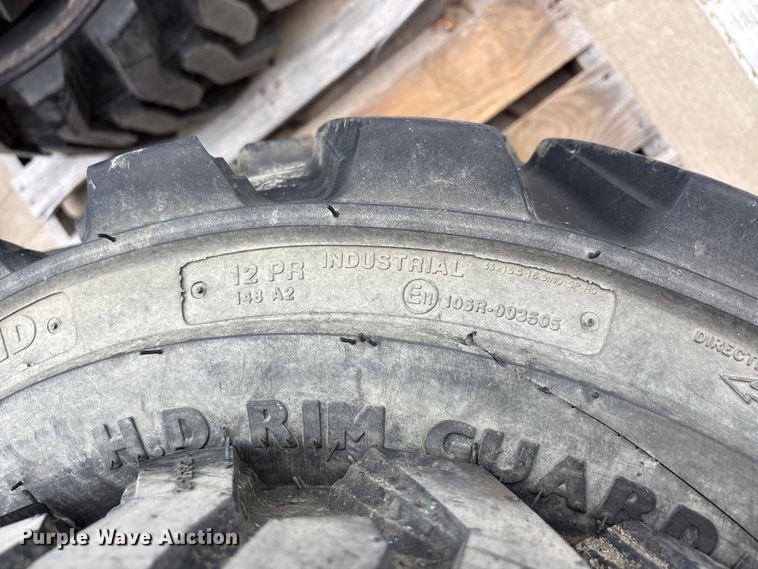 image for item EU0323 (4) BKT tractor tires and wheels