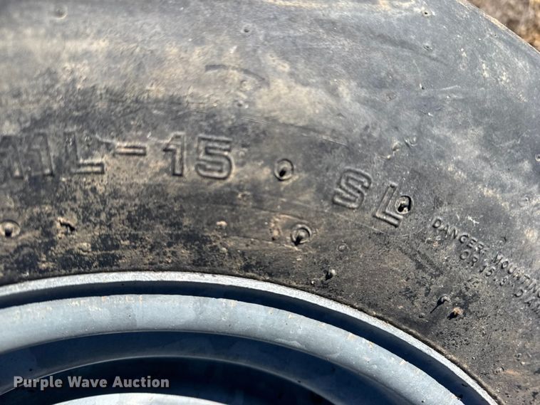 image for item FB7031 (13) 11L-15 tires and wheels