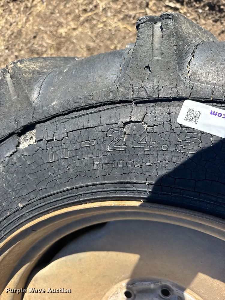 image for item FB7032 (8) 11-24.5 tires and wheels