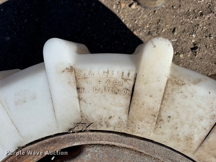 image for item FB7078 (2) 11.2-24 plastic pivot tires