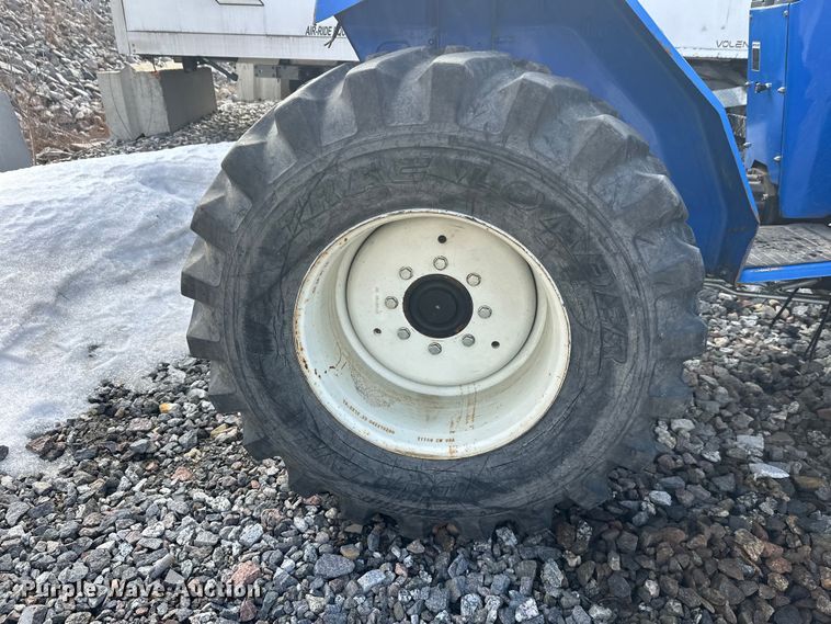 image for item YA2573 2005 New Holland TC30 MFWD tractor