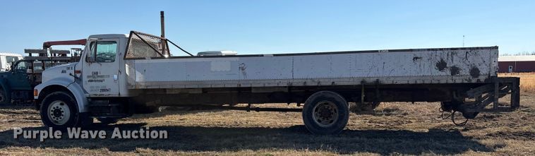 image for item ES8556 1999 International 4700 flatbed truck