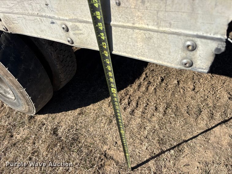 image for item ES8556 1999 International 4700 flatbed truck