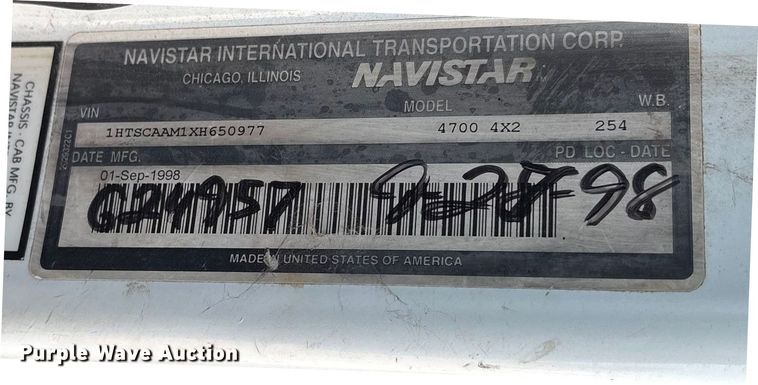 image for item ES8556 1999 International 4700 flatbed truck