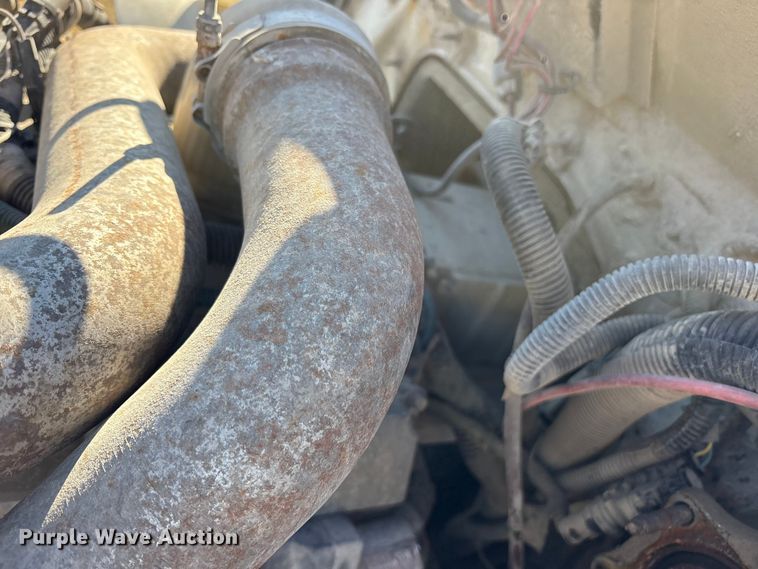 image for item ES8556 1999 International 4700 flatbed truck