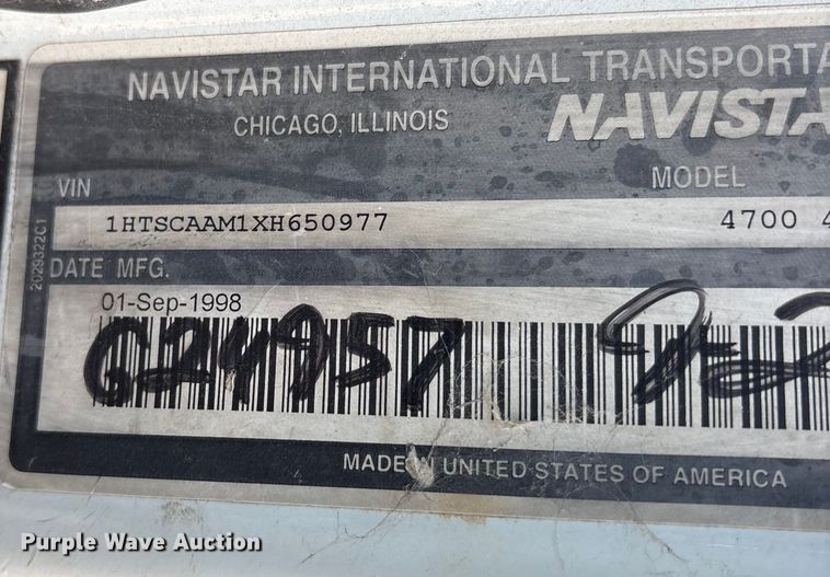 image for item ES8556 1999 International 4700 flatbed truck