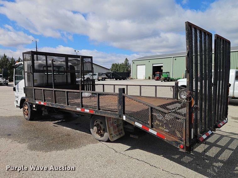 image for item EO7089 2010 Isuzu NPR flatbed truck