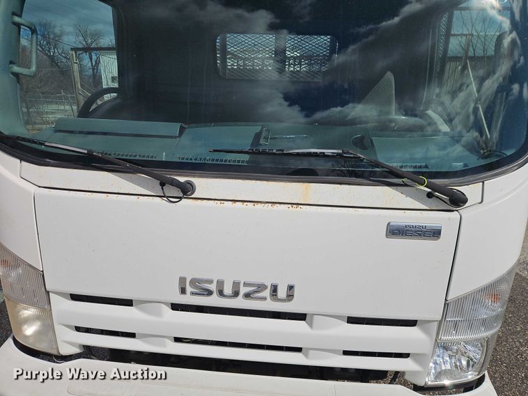 image for item EO7089 2010 Isuzu NPR flatbed truck