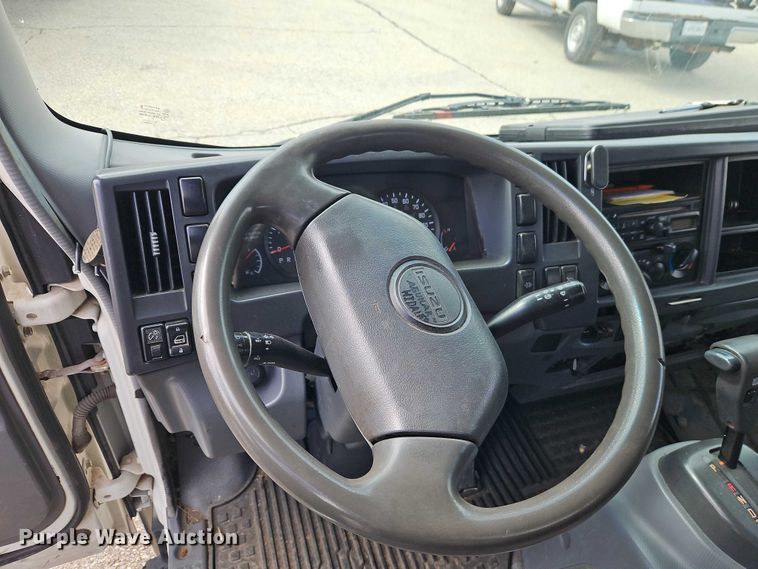 image for item EO7089 2010 Isuzu NPR flatbed truck