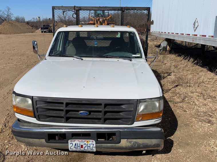 image for item FB3144 1997 Ford F350 flatbed pickup truck