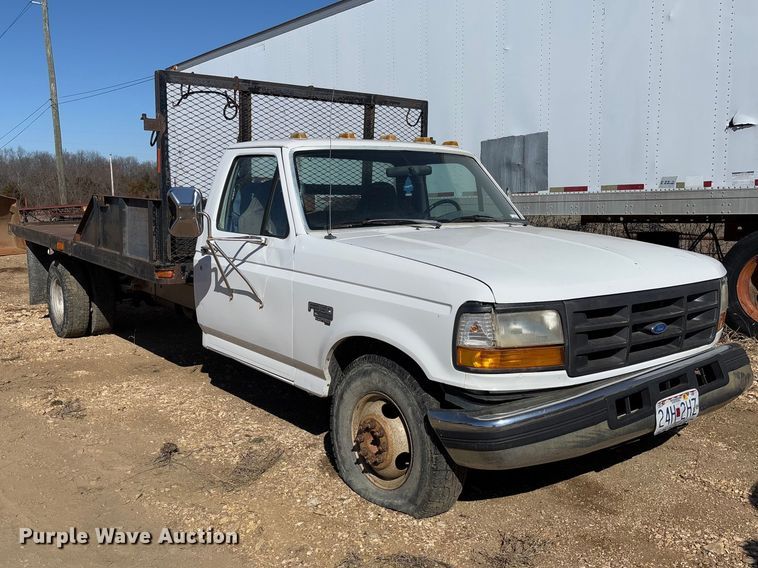 image for item FB3144 1997 Ford F350 flatbed pickup truck