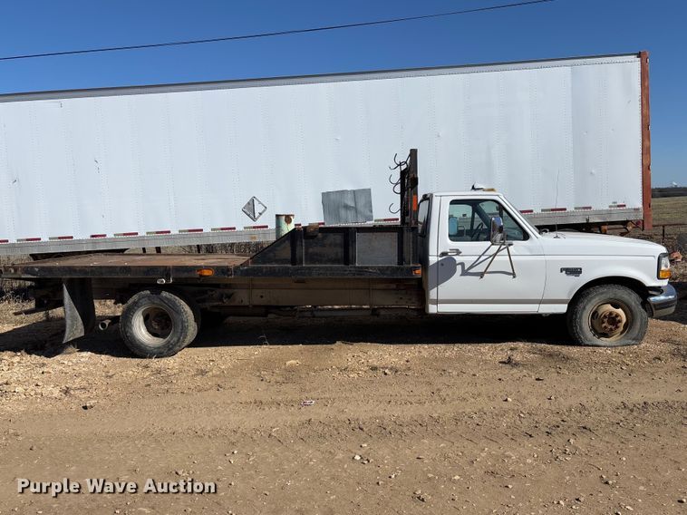 image for item FB3144 1997 Ford F350 flatbed pickup truck