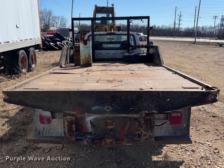 image for item FB3144 1997 Ford F350 flatbed pickup truck