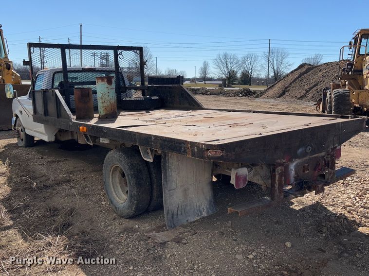 image for item FB3144 1997 Ford F350 flatbed pickup truck