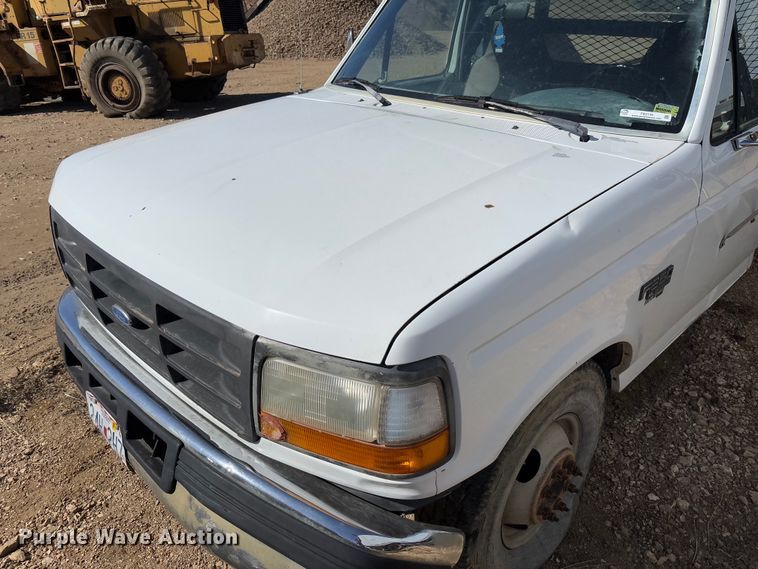 image for item FB3144 1997 Ford F350 flatbed pickup truck