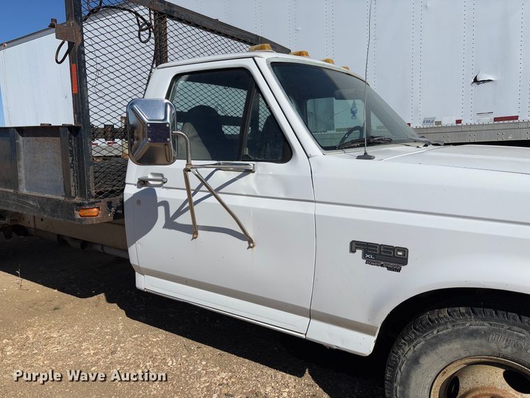image for item FB3144 1997 Ford F350 flatbed pickup truck