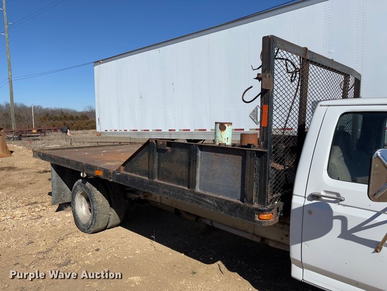 image for item FB3144 1997 Ford F350 flatbed pickup truck