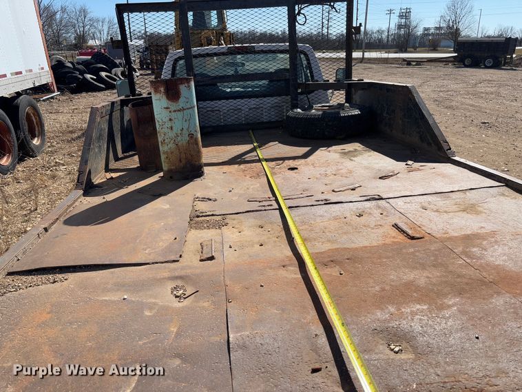 image for item FB3144 1997 Ford F350 flatbed pickup truck