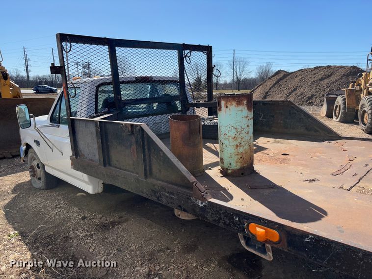 image for item FB3144 1997 Ford F350 flatbed pickup truck