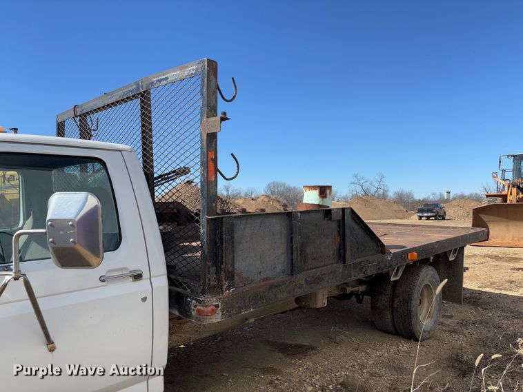 image for item FB3144 1997 Ford F350 flatbed pickup truck