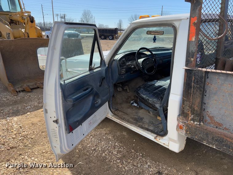 image for item FB3144 1997 Ford F350 flatbed pickup truck