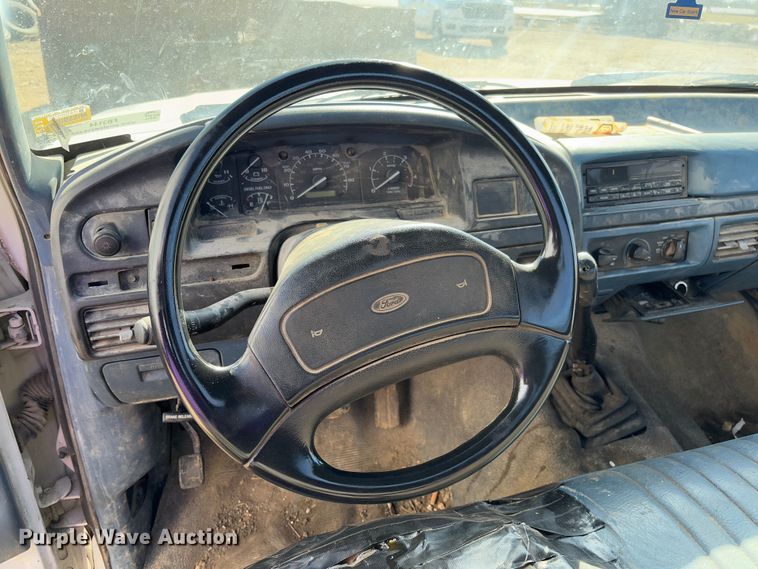 image for item FB3144 1997 Ford F350 flatbed pickup truck