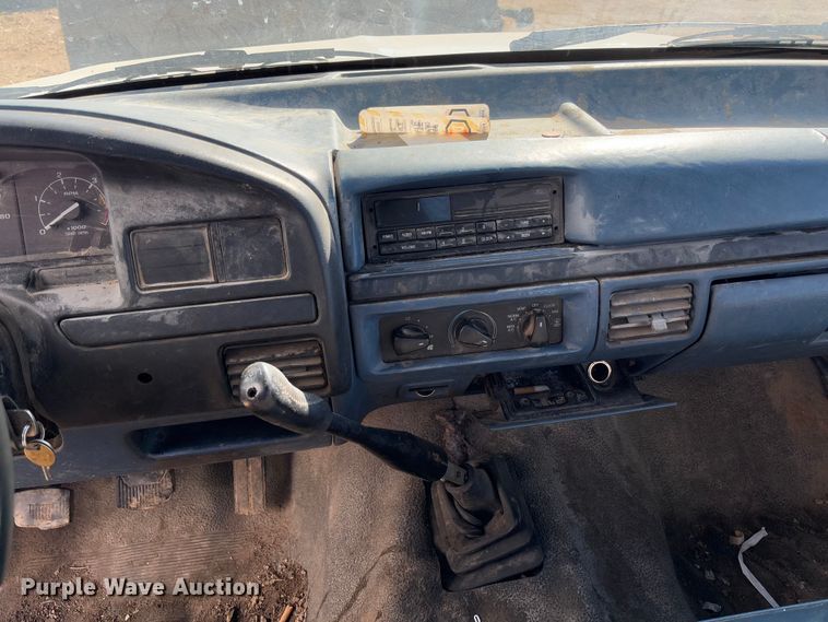 image for item FB3144 1997 Ford F350 flatbed pickup truck
