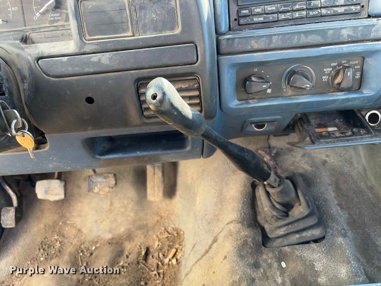 image for item FB3144 1997 Ford F350 flatbed pickup truck