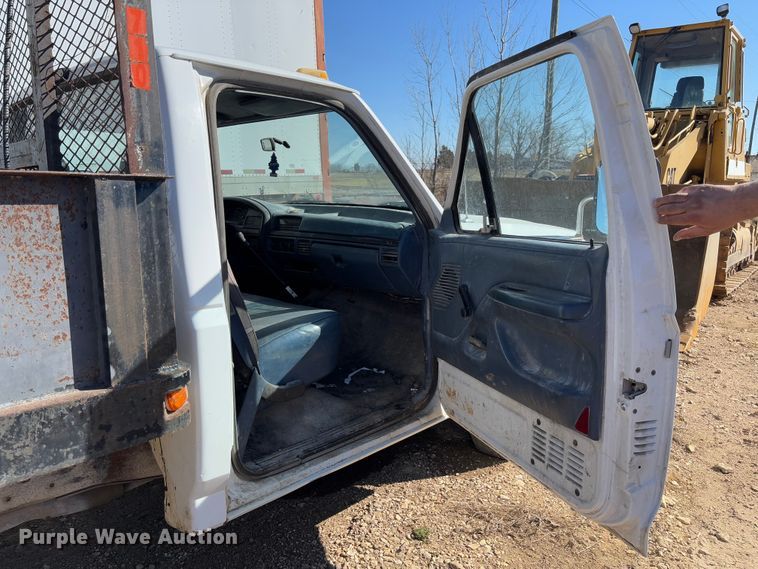 image for item FB3144 1997 Ford F350 flatbed pickup truck