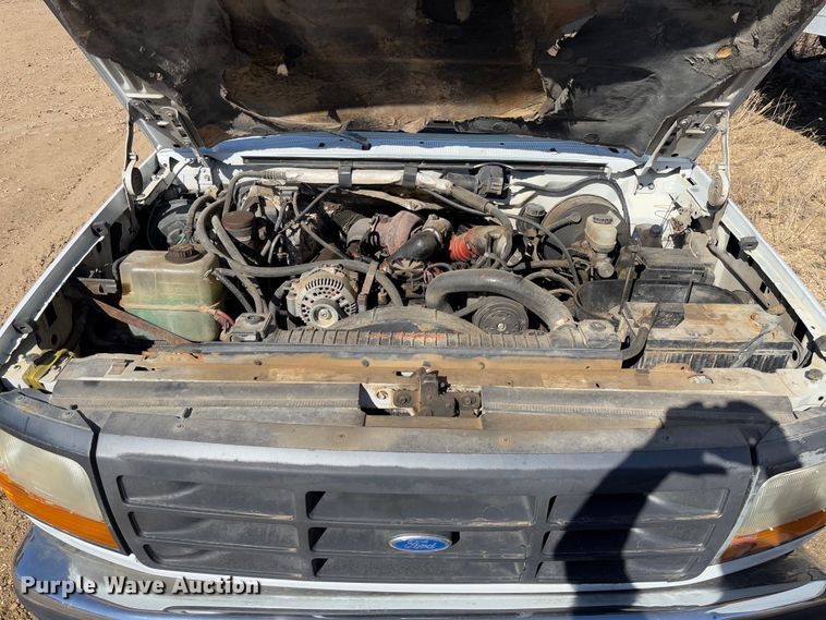 image for item FB3144 1997 Ford F350 flatbed pickup truck
